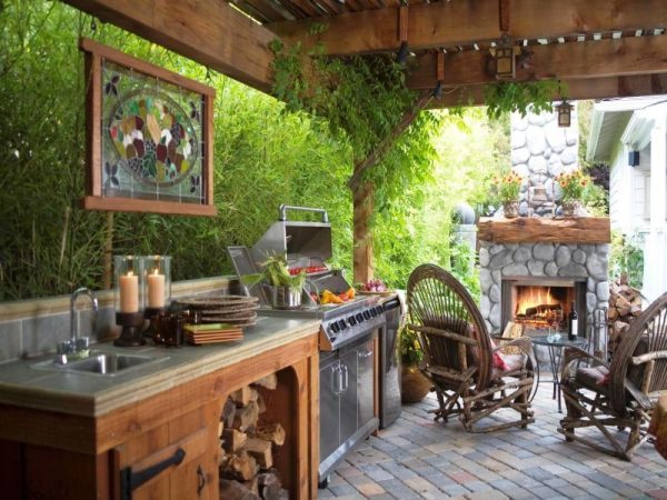 outdoor kitchen with fireplace