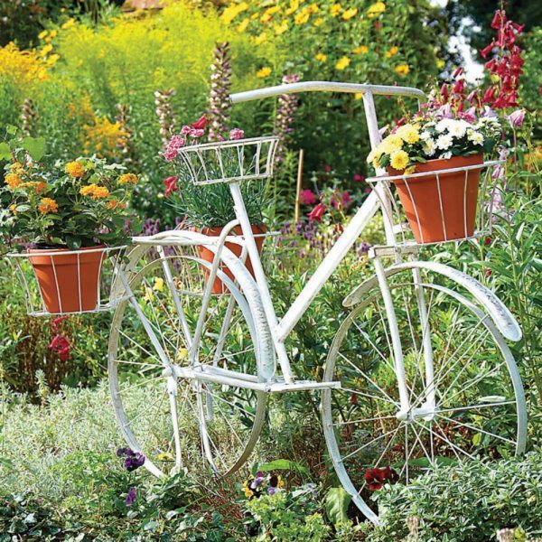 bicycle planter stands outdoors