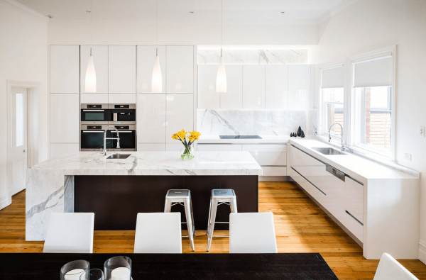 white kitchen with hardwood floors