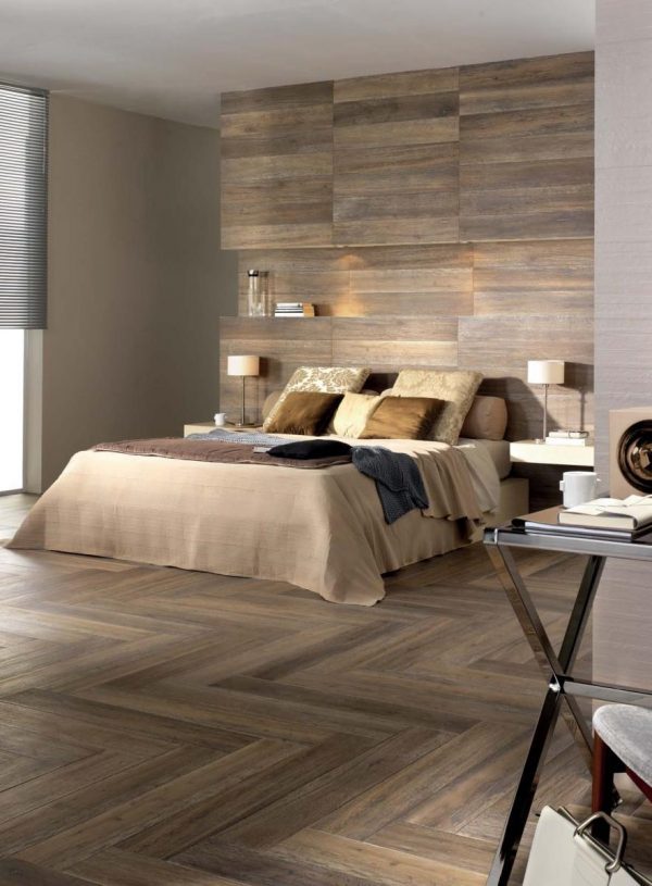 Laminate flooring on walls for a warm and luxurious feel of the