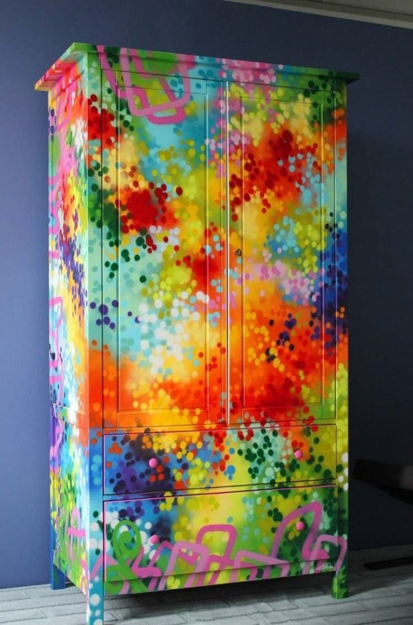 spray painting a dresser