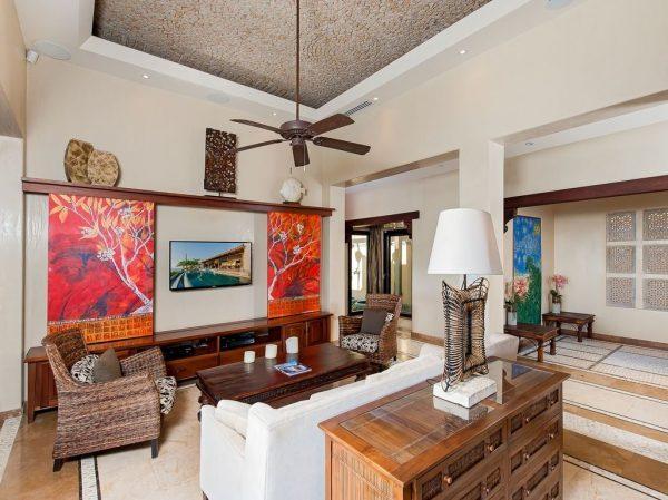 hide wall mounted tv behind art