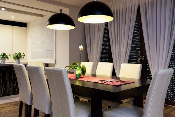 hanging light fixture over dining room table