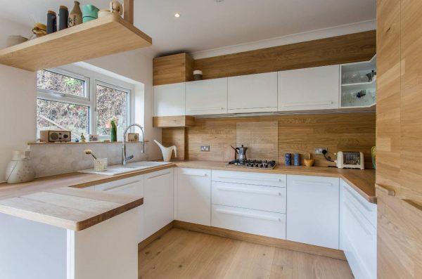 white kitchen with wood accents
