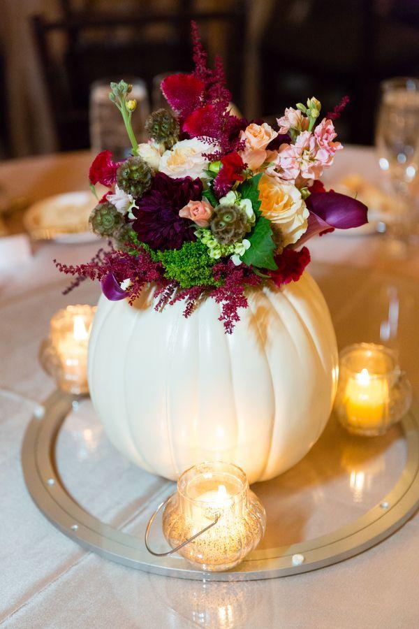 flowers in a pumpkin