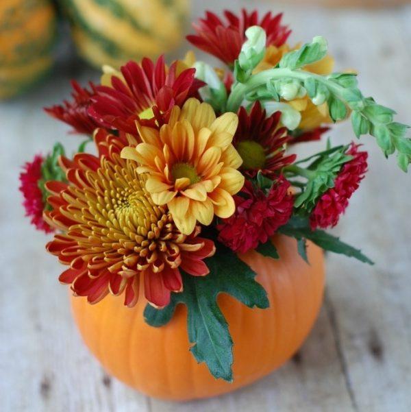 flowers in pumpkins centerpieces