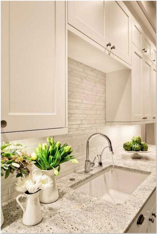 kashmir white granite with white cabinets