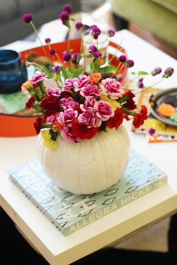 flowers in a pumpkin centerpiece